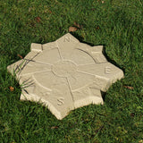 Compass Stepping Stone 440mm Buff on grass