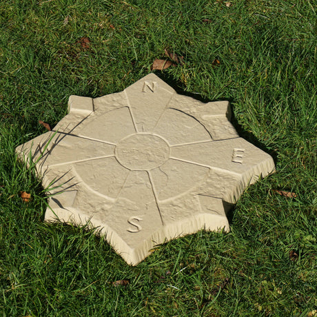 Compass Stepping Stone 440mm Buff on grass