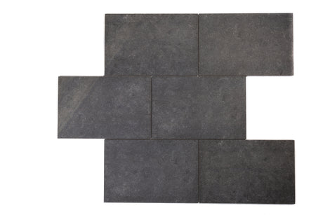 Raven black porcelain paving tiles, arranged in a neat grid.